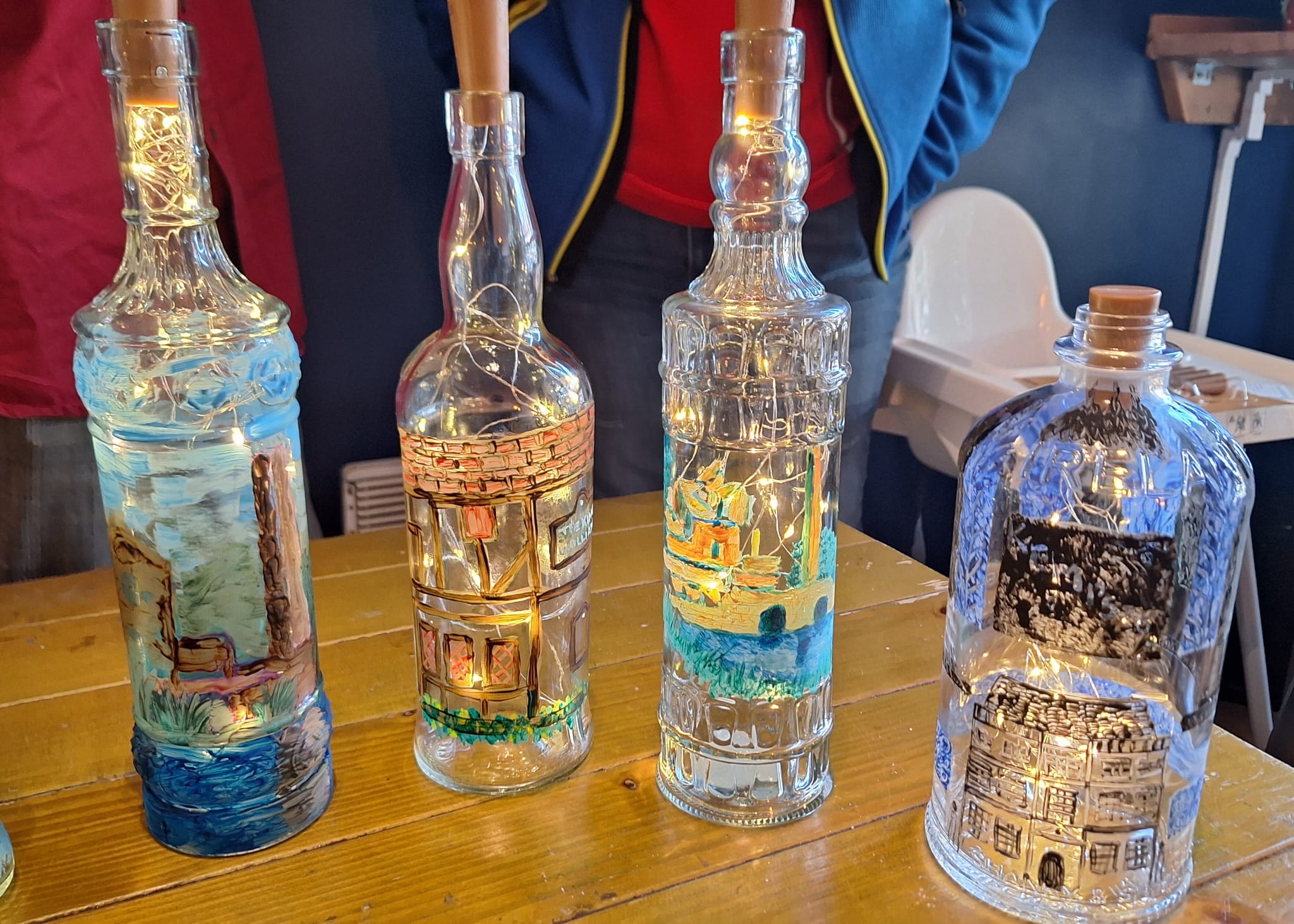 Painted glass bottle with lights inside