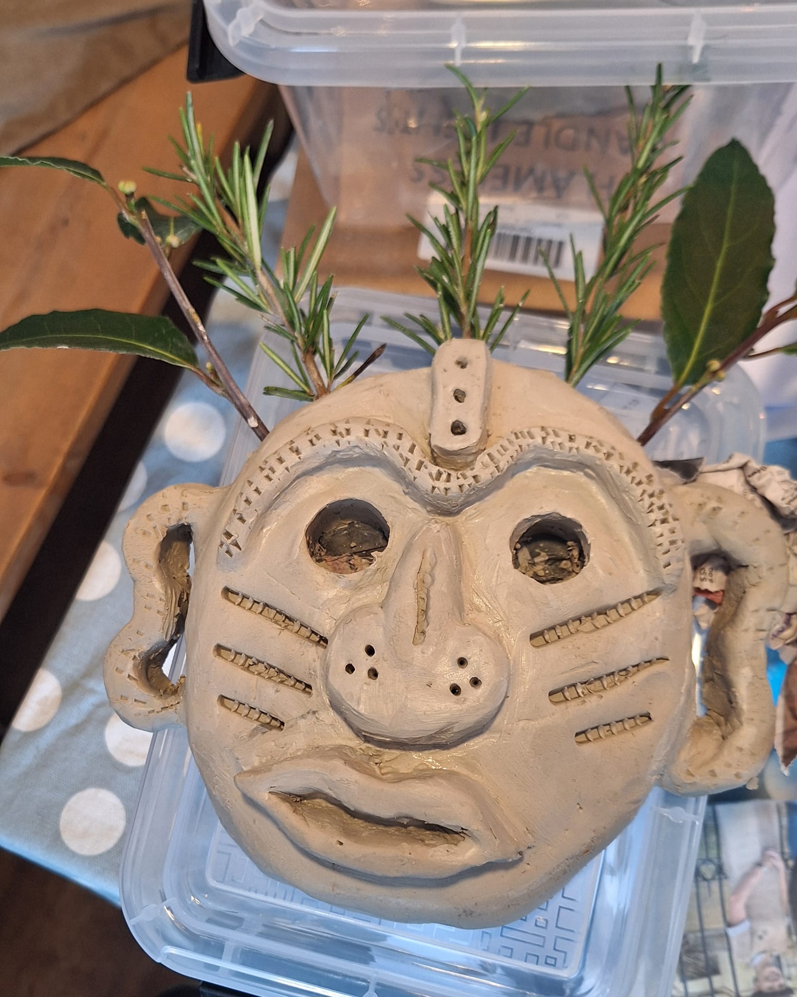 Clay mask being sculpted